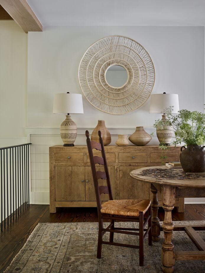 The tight neutral color palette allows the variety of wood grains and woven patterns to come to the fore.
